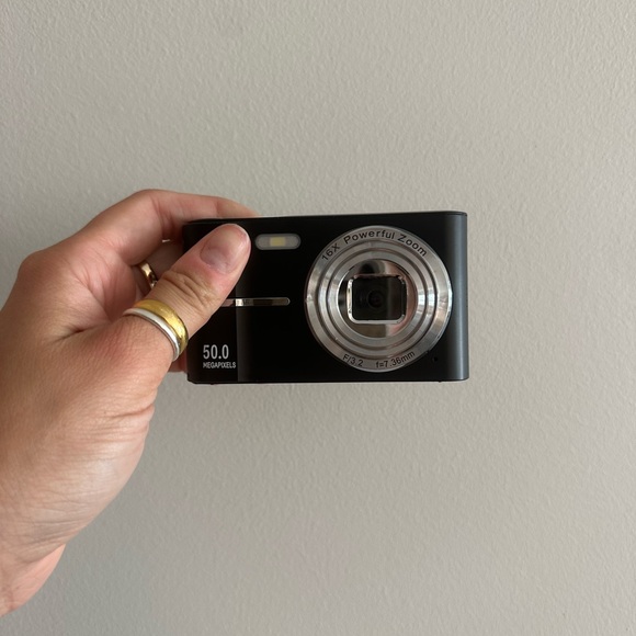 Black Digital Camera with Silver Lens
